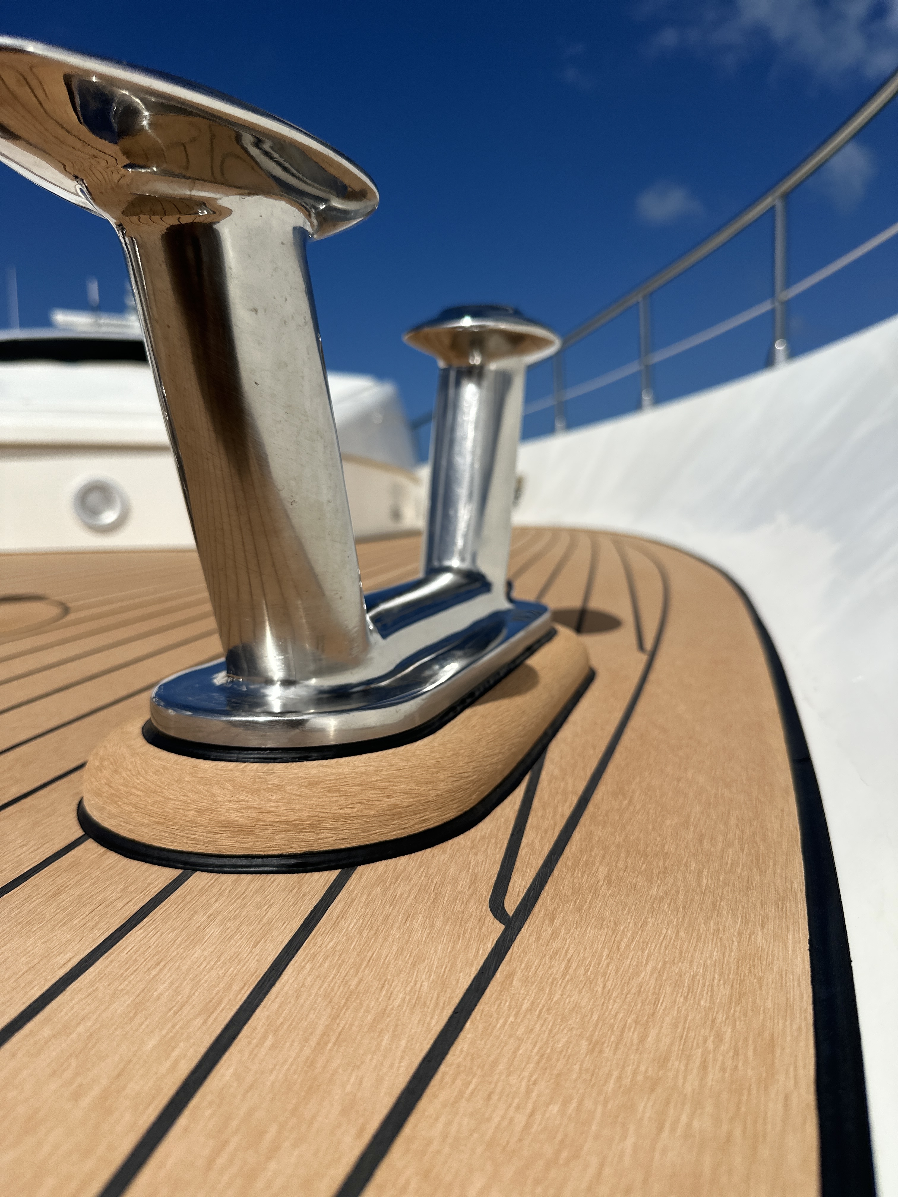 Nordeck composite teak deck detail at a polished bow cleat