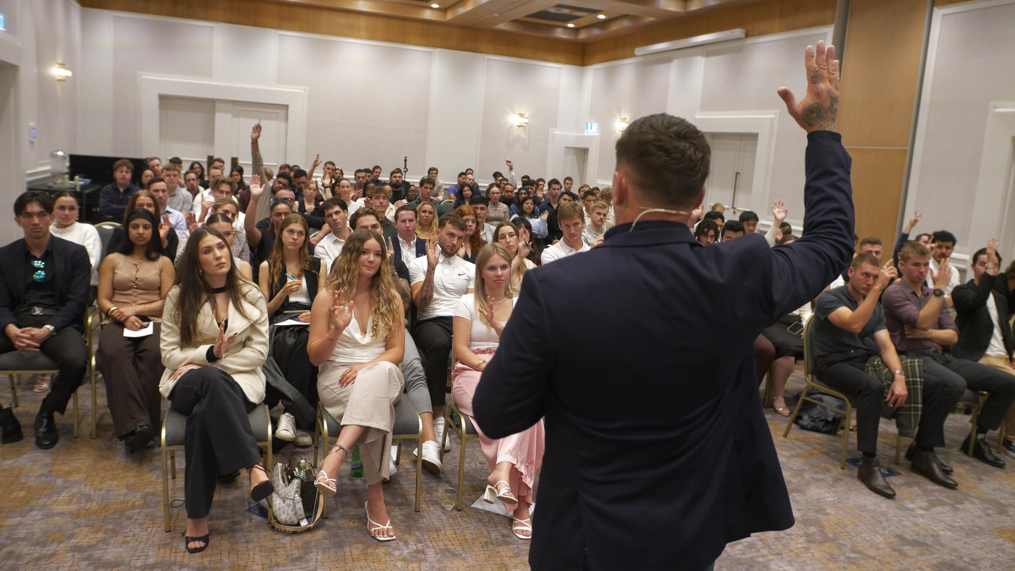 People at the Future Leaders Summit Gold Coast showing their muscles