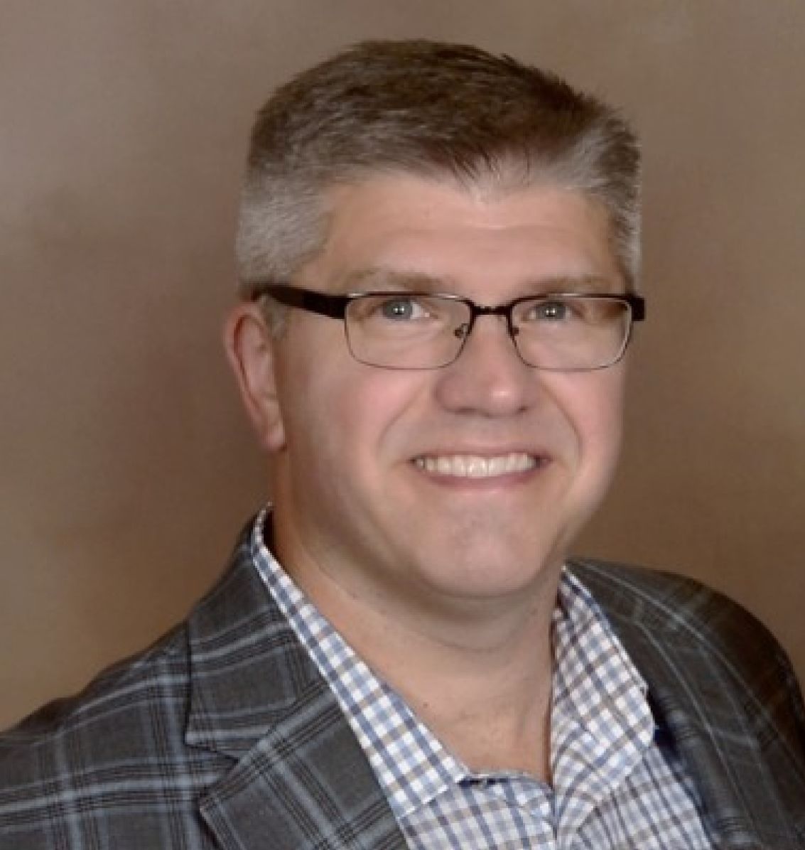 Michael Holmstadt, Founder of Think Revenue Strategies