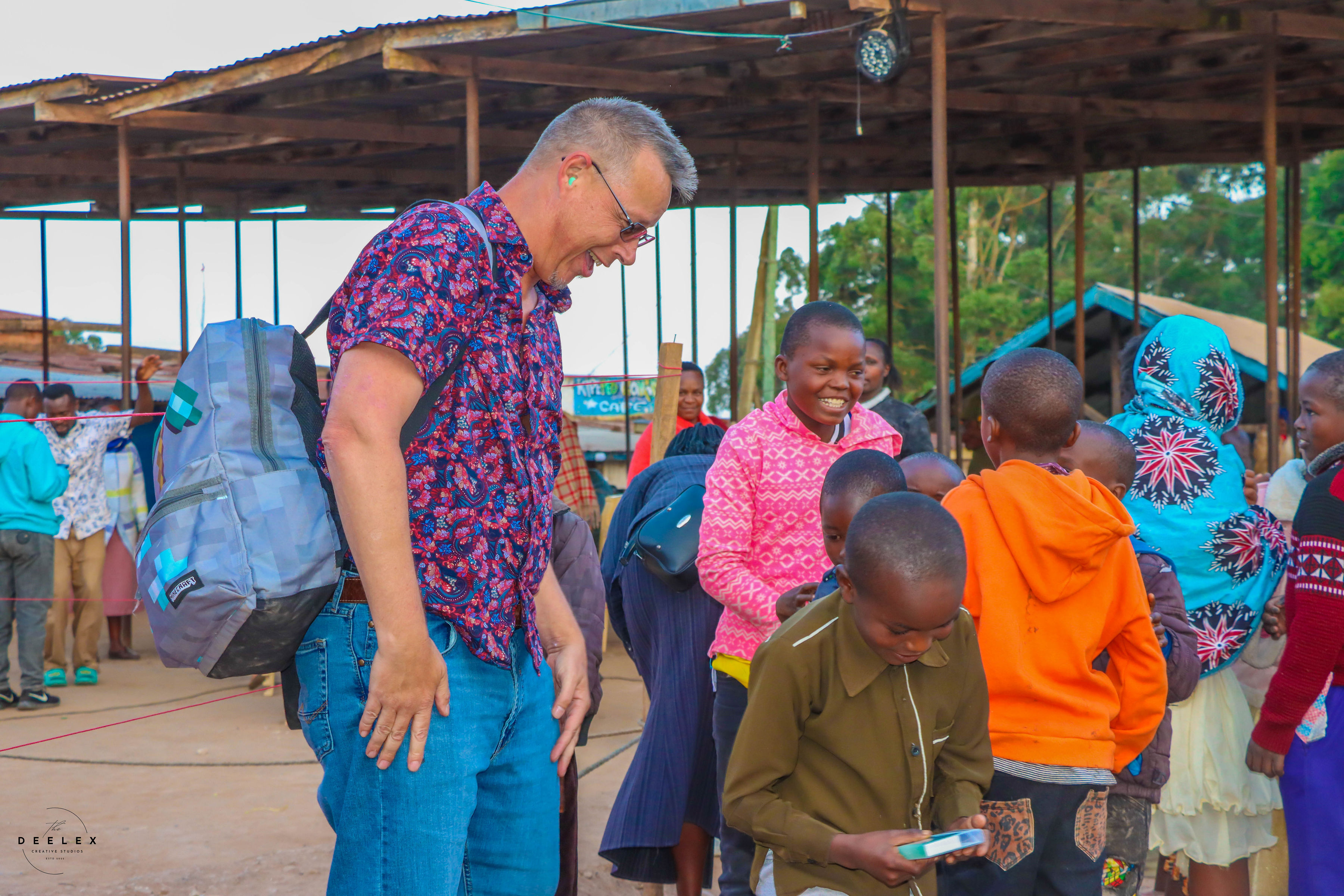 Dr. John E. Avocado during community outreach in Kenya
