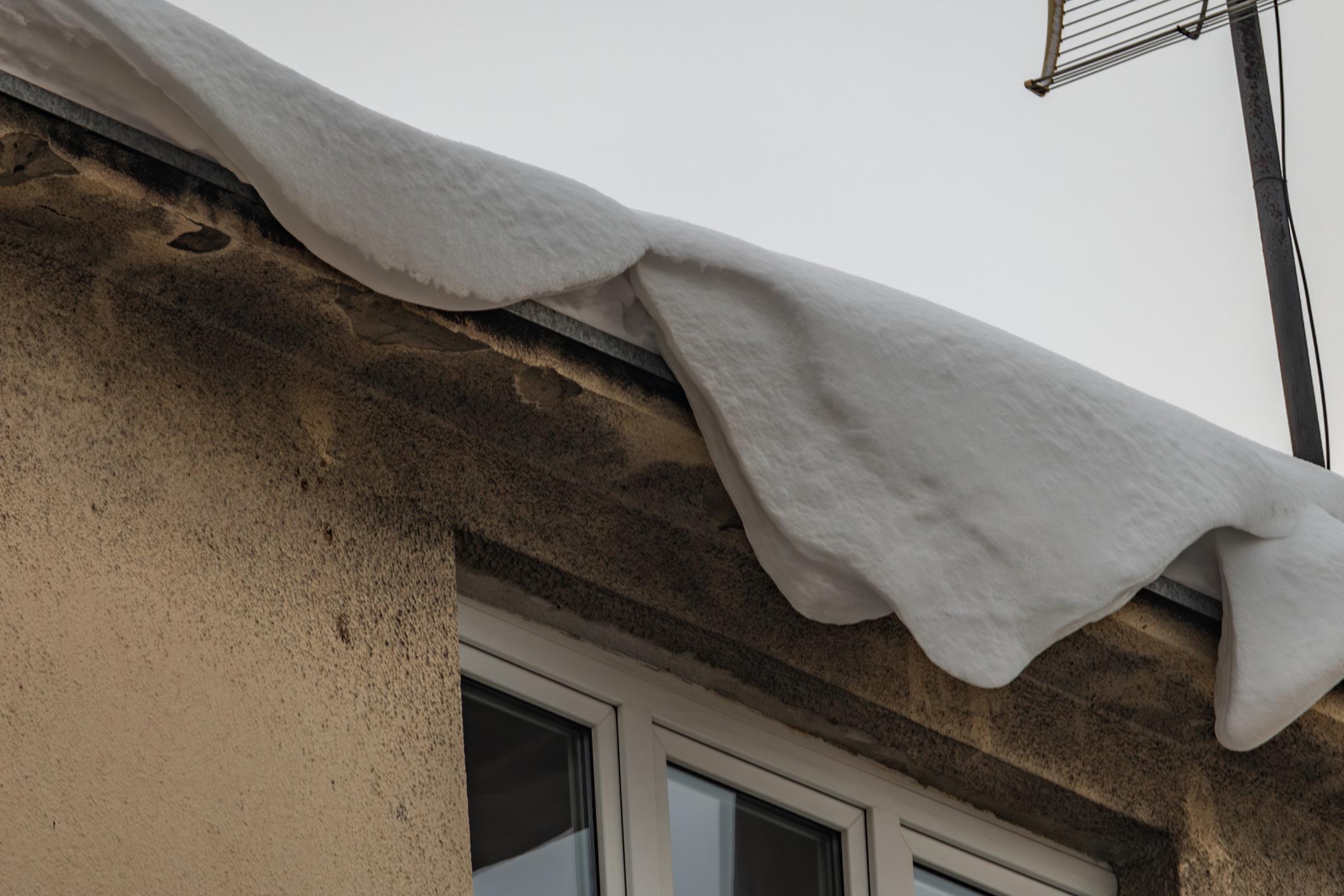 winter roof damage ice dam Grande Prairie Alberta