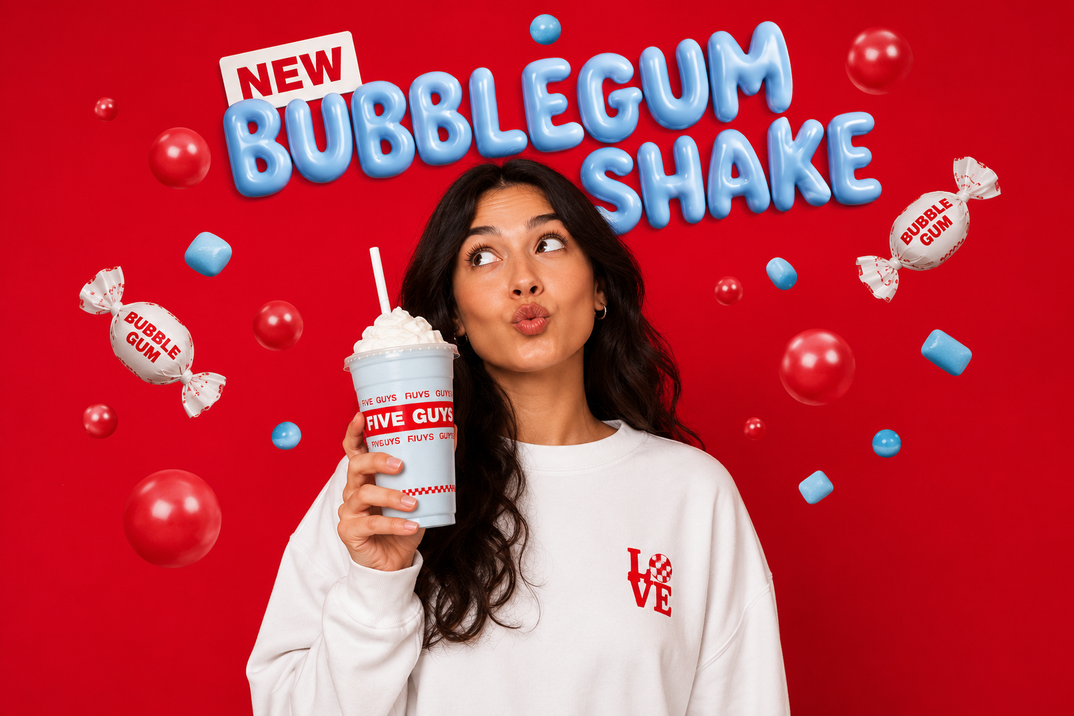Creator holding the Five Guys Bubblegum Shake to camera