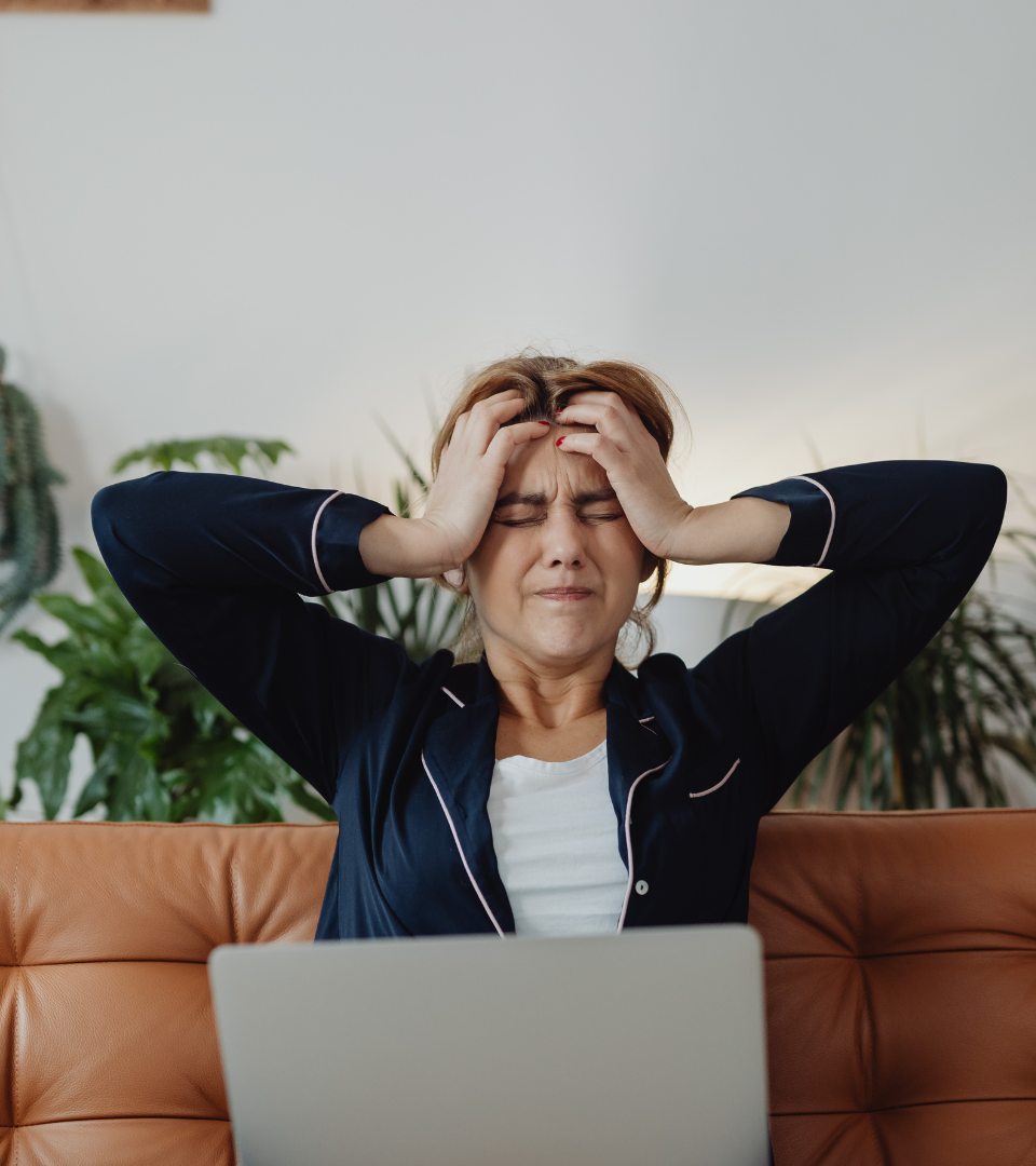 Woman looking tired and overwhelmed