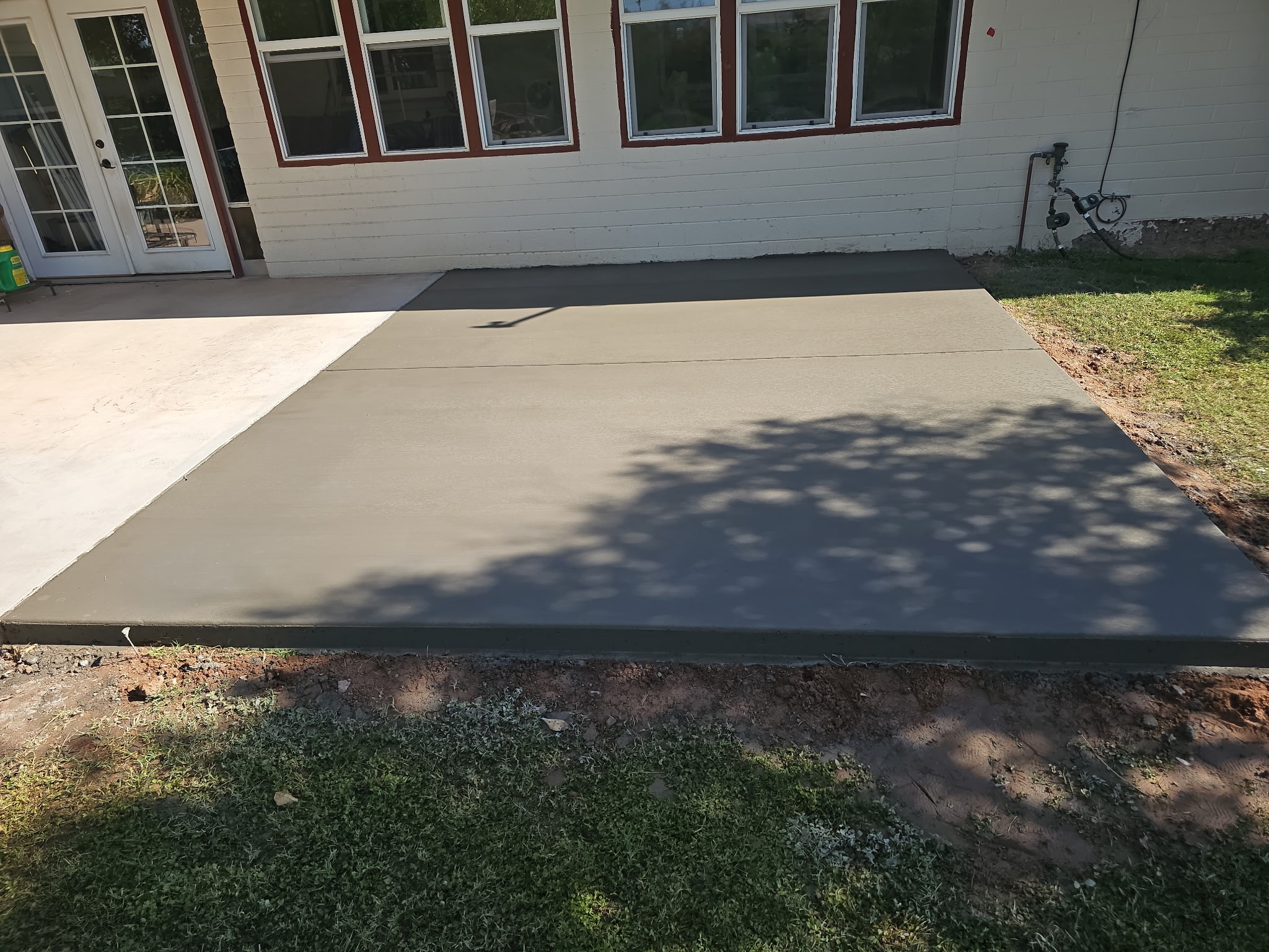 Finished concrete driveway Gilbert AZ - New Foundations Construction