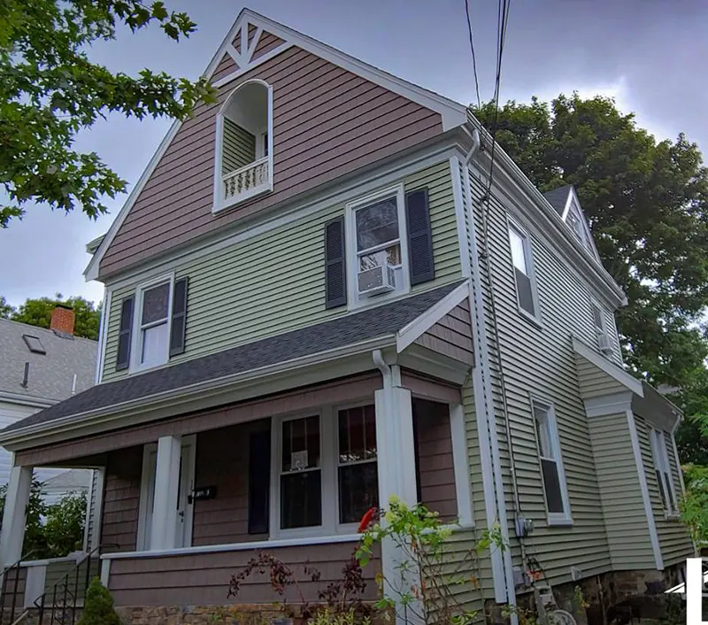 Home featuring professionally installed gutters protecting walls and foundation