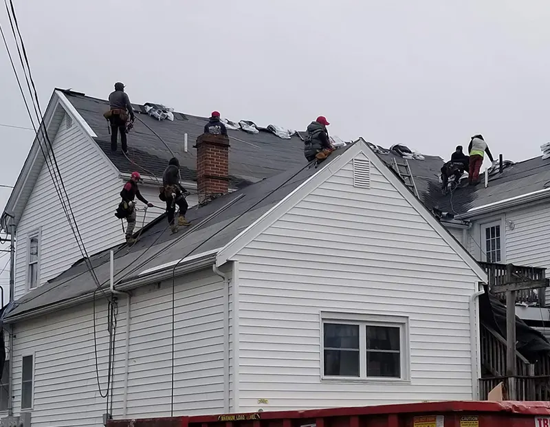 Residential roof installation in Abington, MA by Lema Construction for lasting protection and quality craftsmanship
