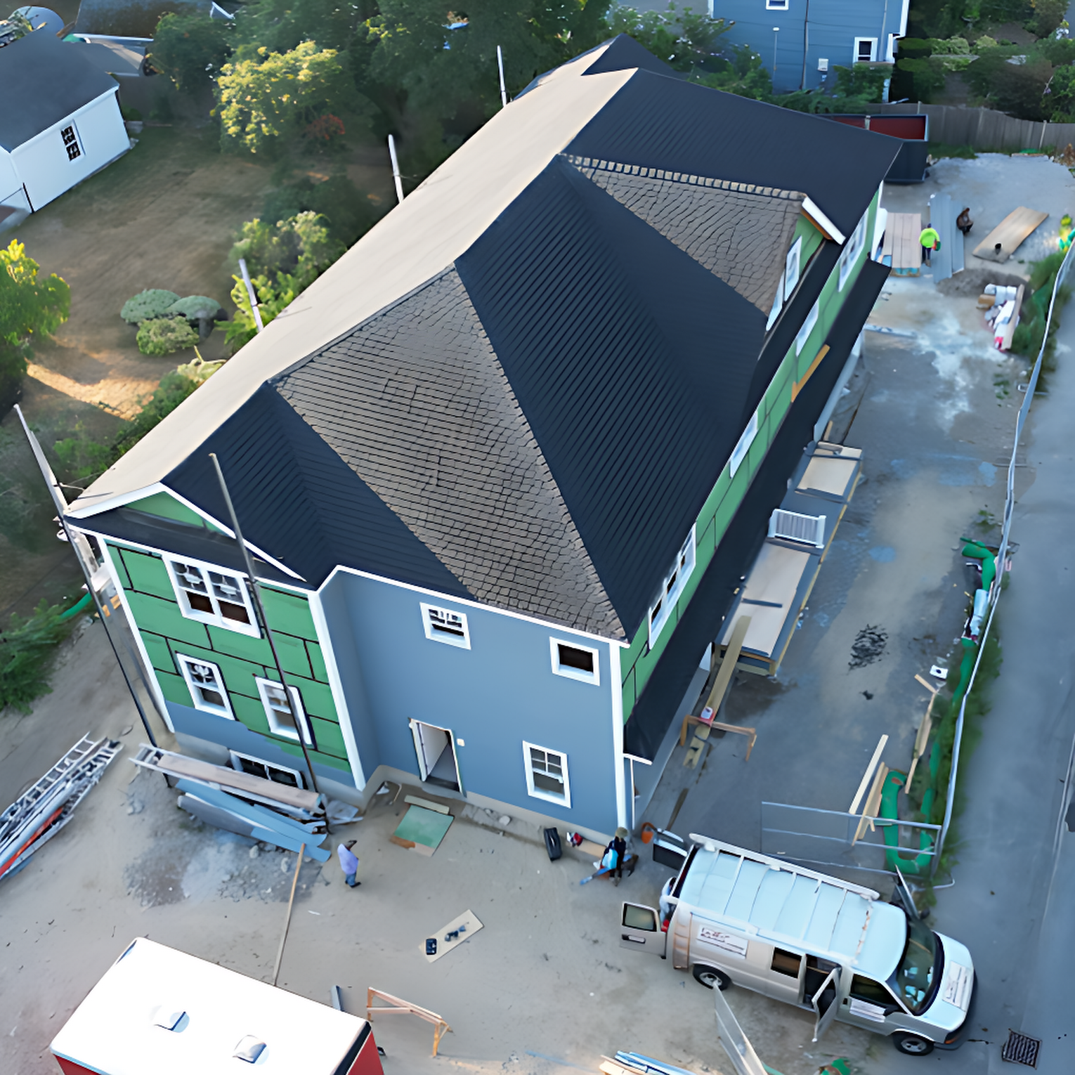 Expert team performing roofing installation in Randolph, MA