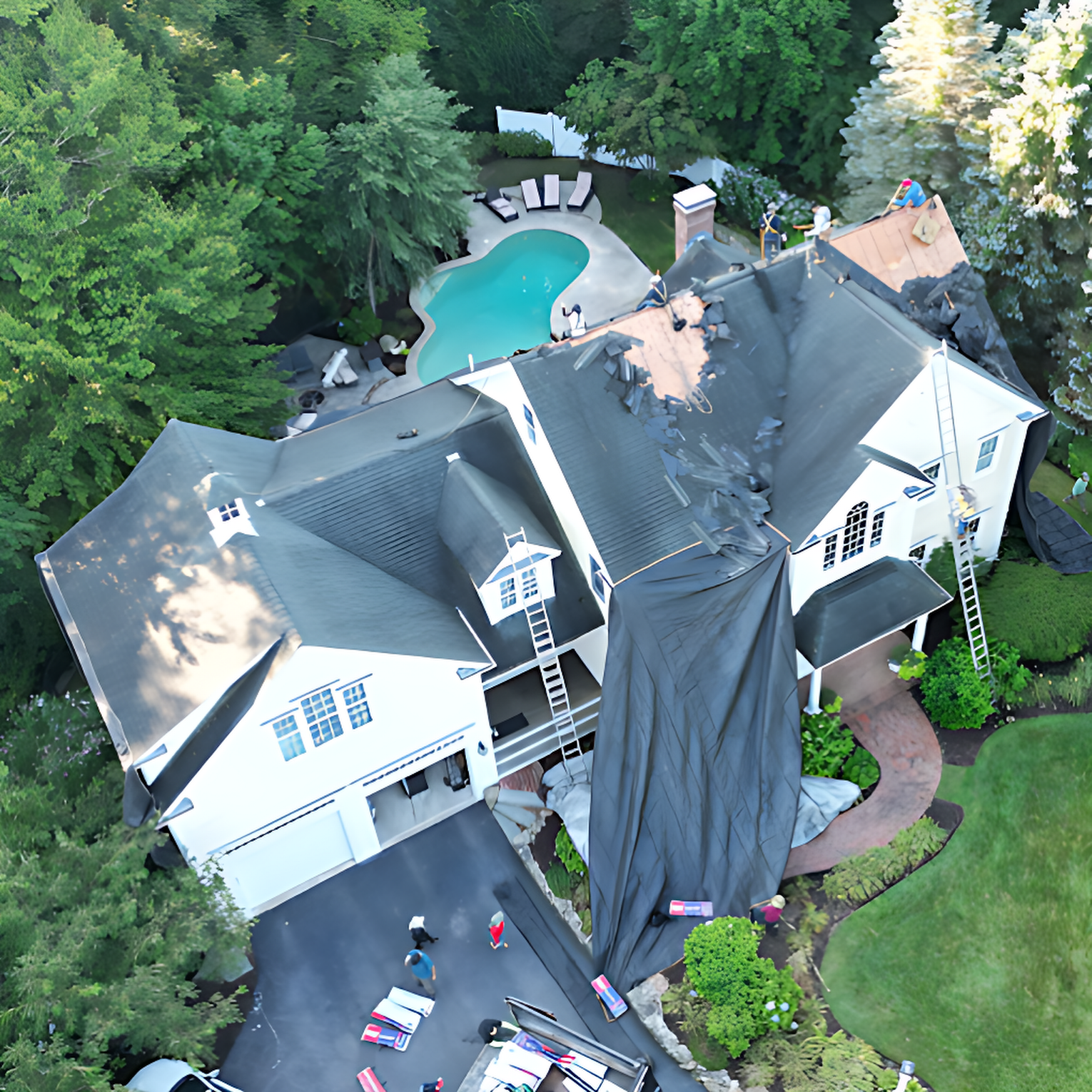 Lema Construction team performing professional roof installation in Stoughton, MA