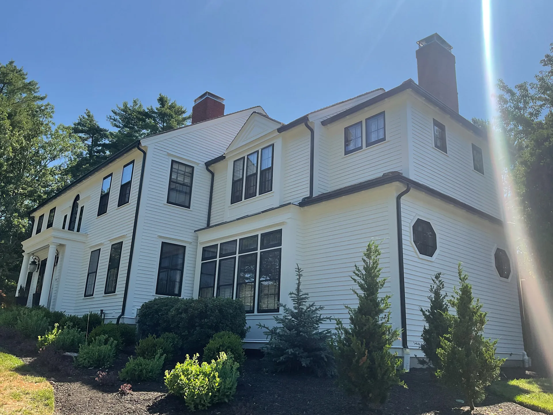 Black Gutters And Downspouts