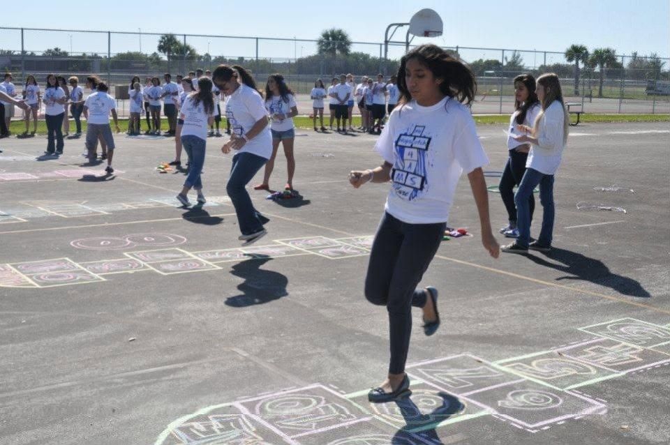 Players compete at a 2012 Hopping 4 A Cure Hopscotch Tournament.