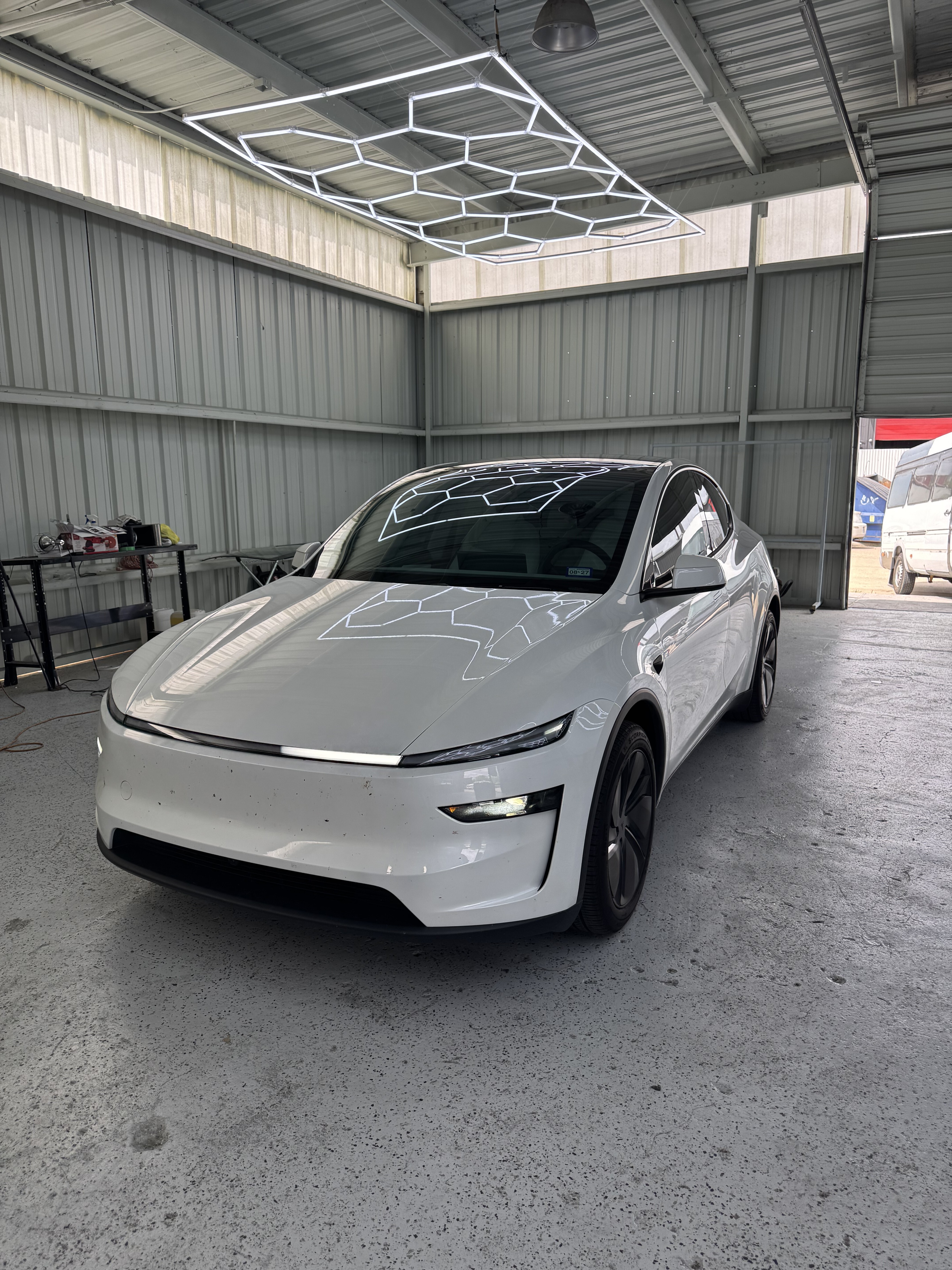 White Tesla with ceramic tint installed
