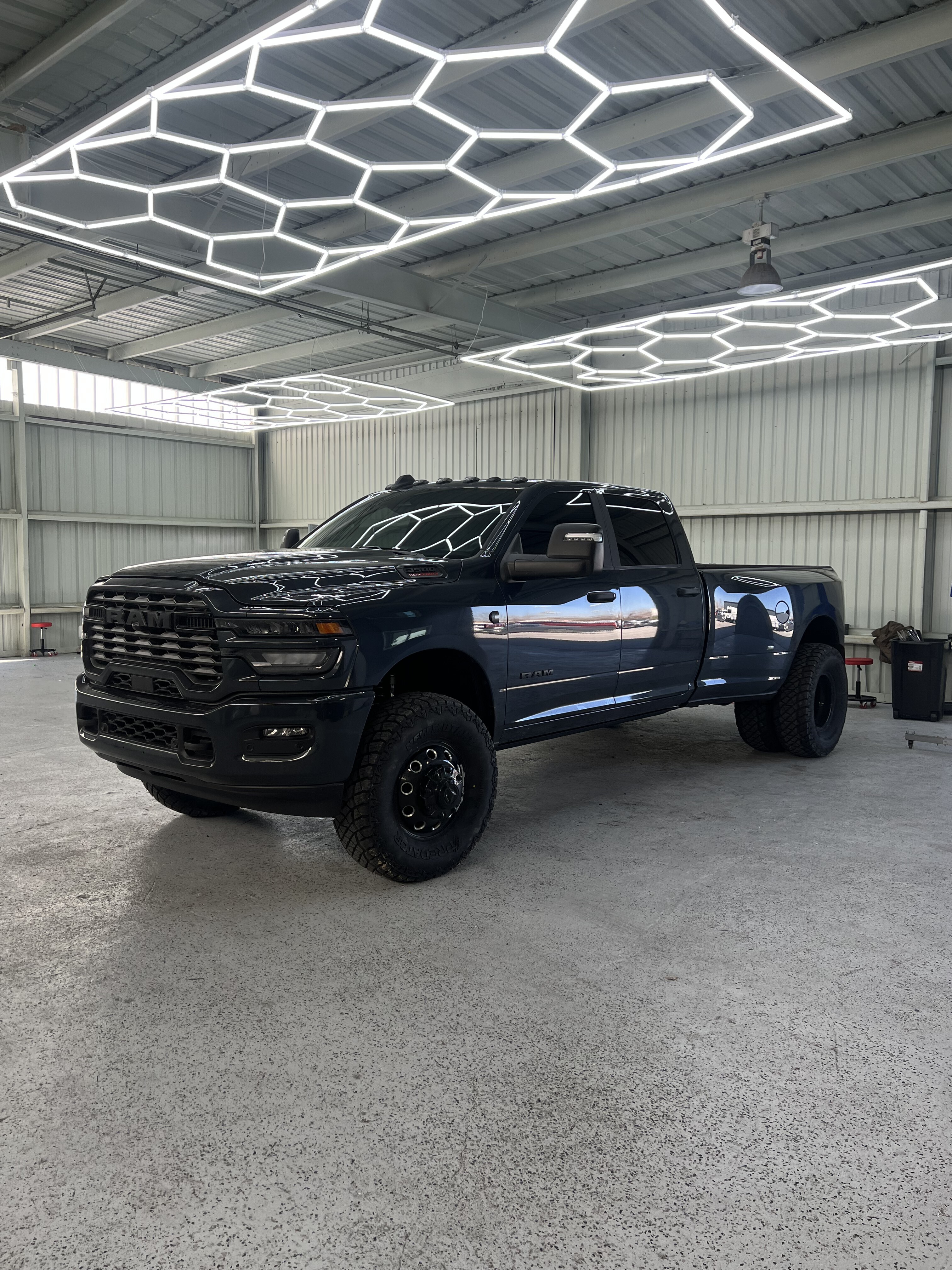 Dark blue Ram 3500 with carbon tint installed