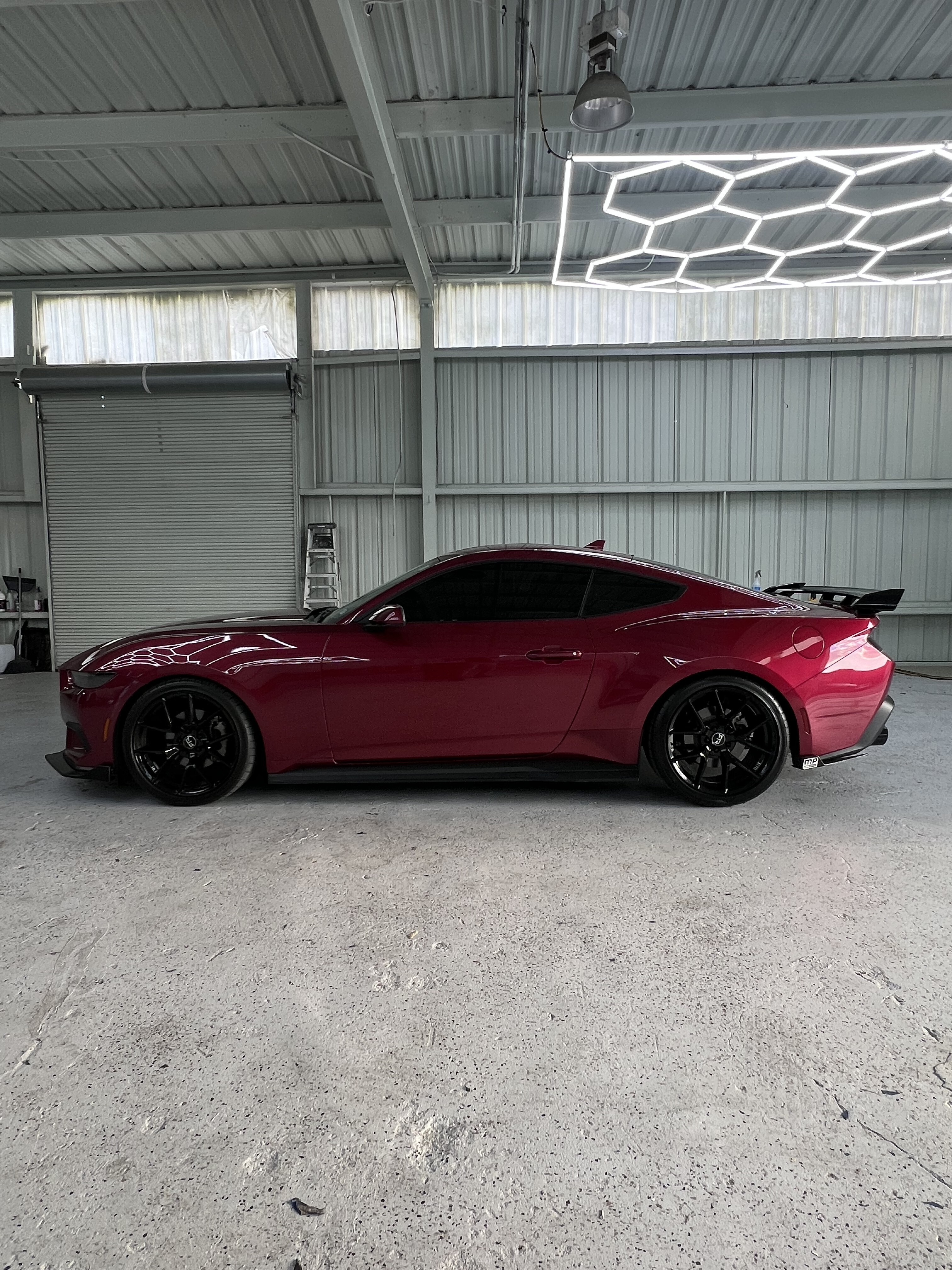 Red Ford Mustang with ceramic tint installed