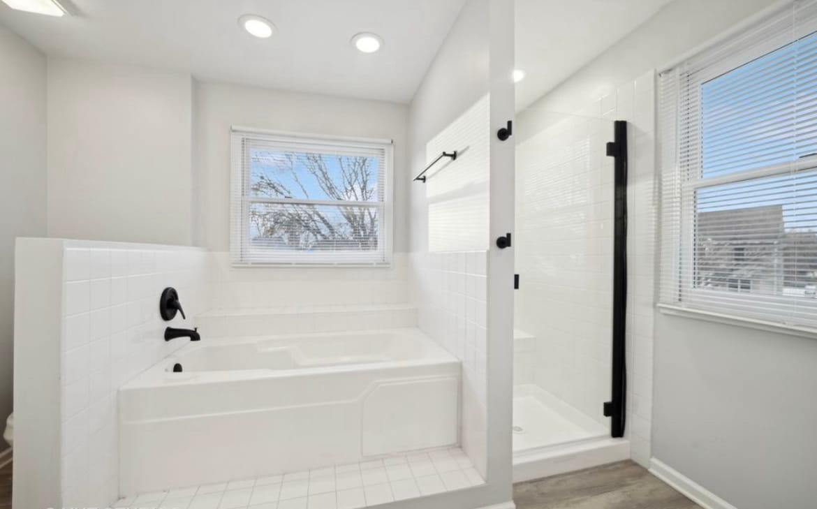 Stunning before and after bathroom makeover featuring modern tile work and fixtures by Custom Bath and Tile