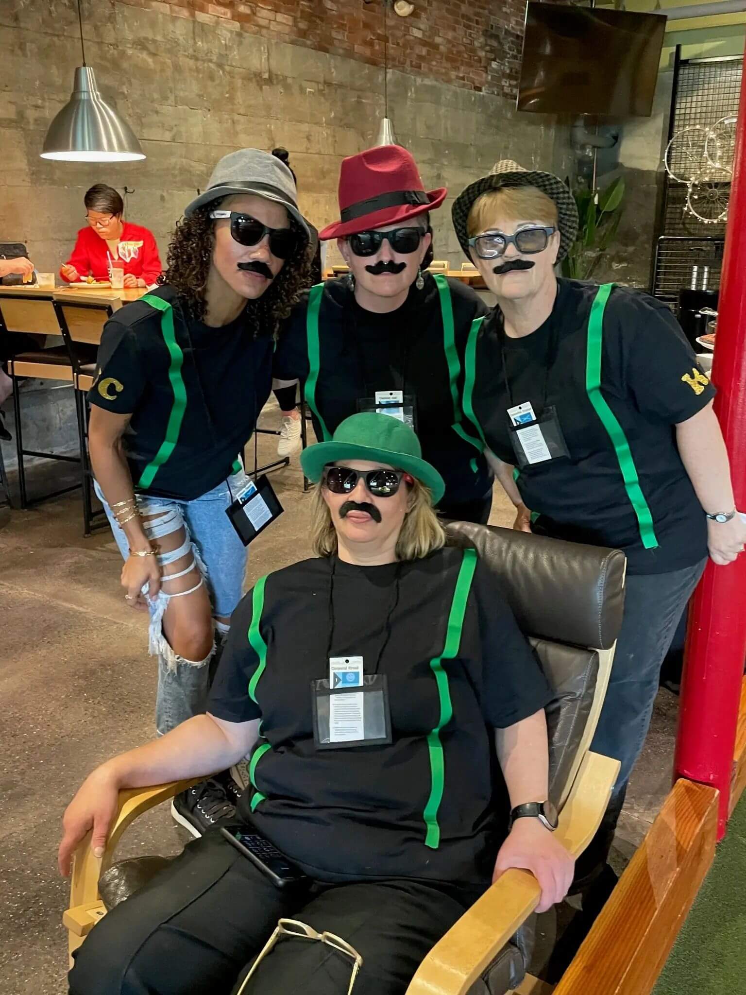 Great Hair in Maine staff enjoying casual team celebration, promoting strong employee relationships and culture.