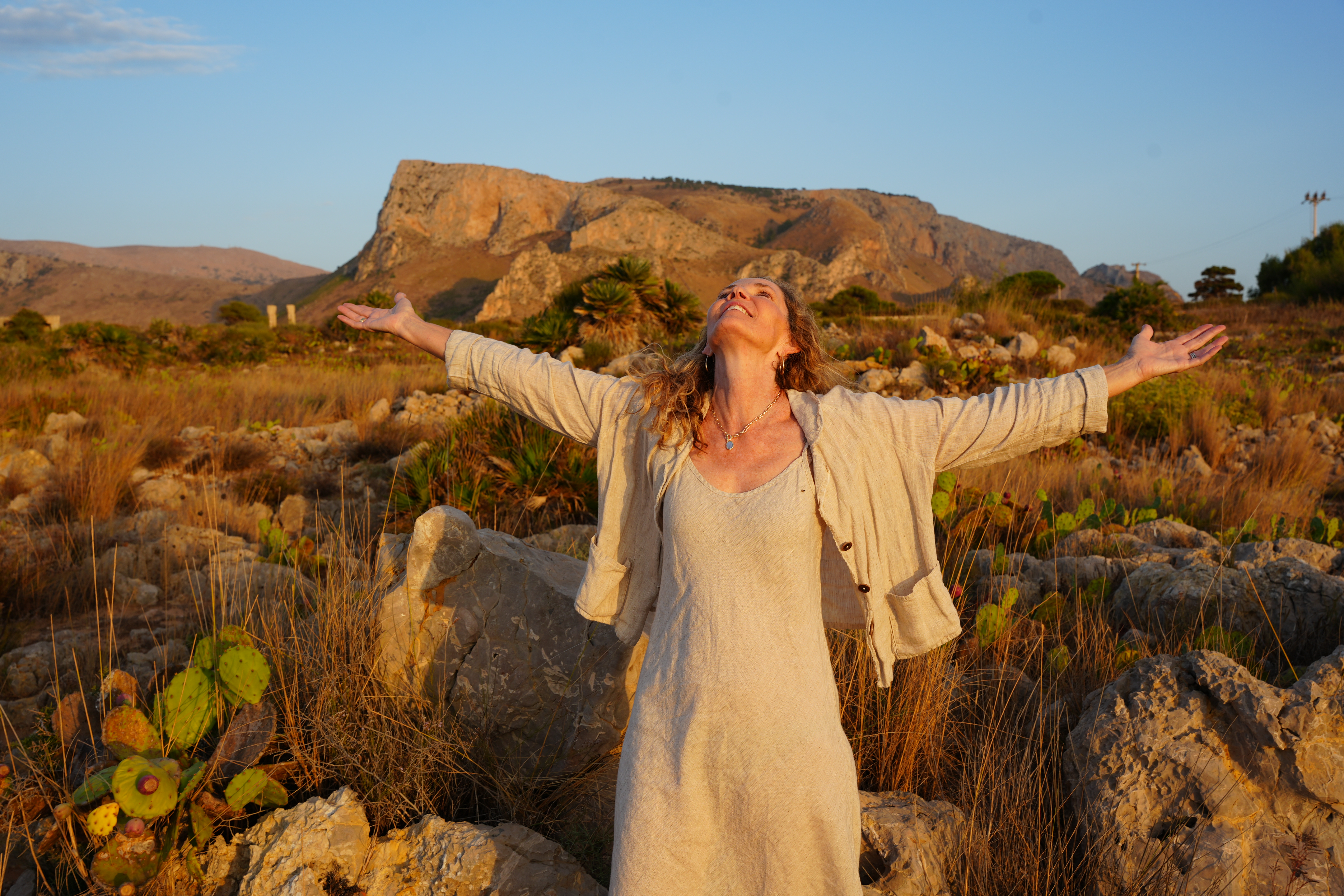 Lea Austen with her arms outstretched