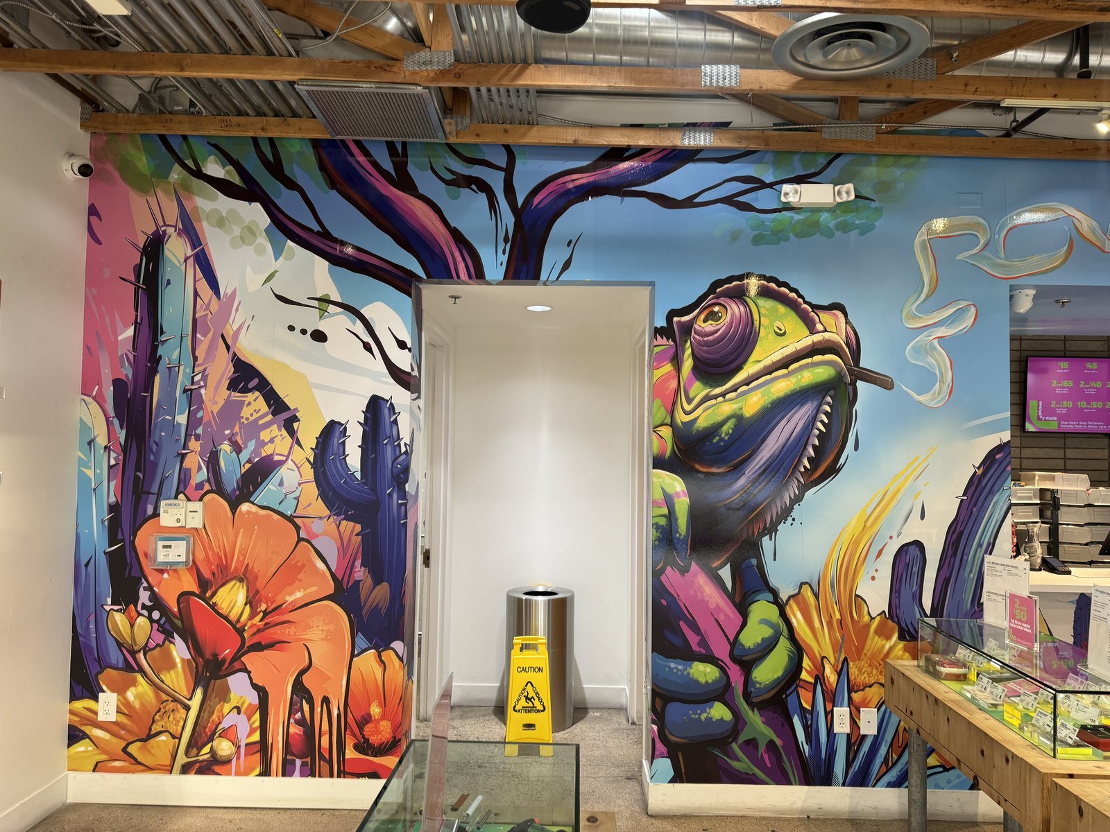 Hand-painted floor-to-ceiling retail wall mural by Retail Print Group