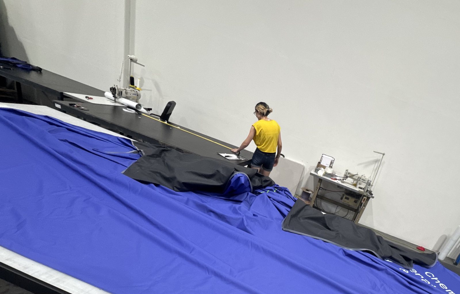 Sewing an SEG fabric panel in-house at Retail Print Group