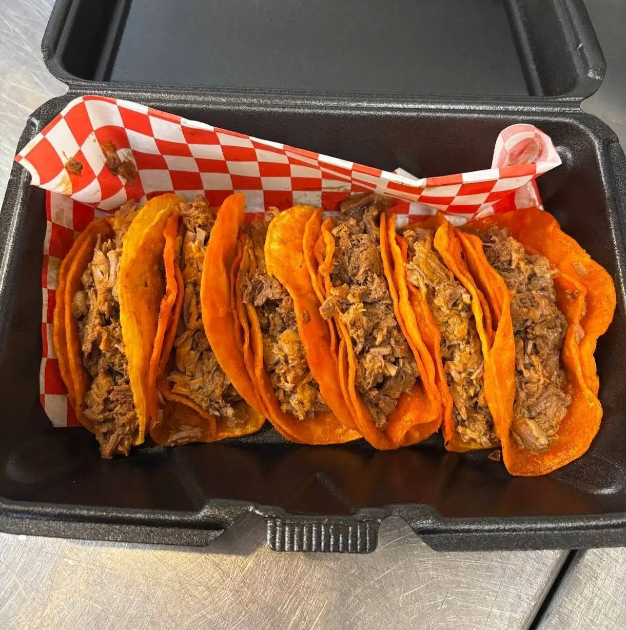 Birria tacos from Tacos Los Gordos