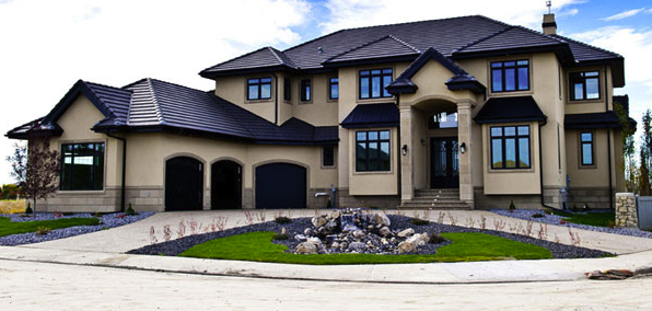 Professional window tinting installation on Edmonton home