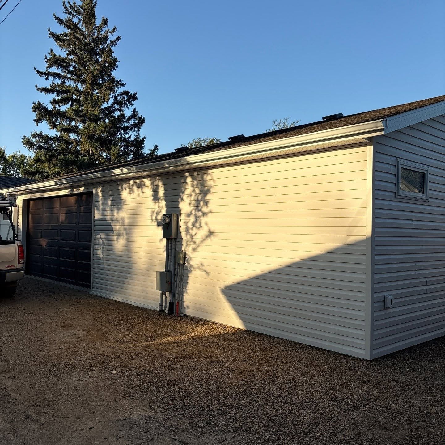 Garage exterior — siding, trim and roofline coordination