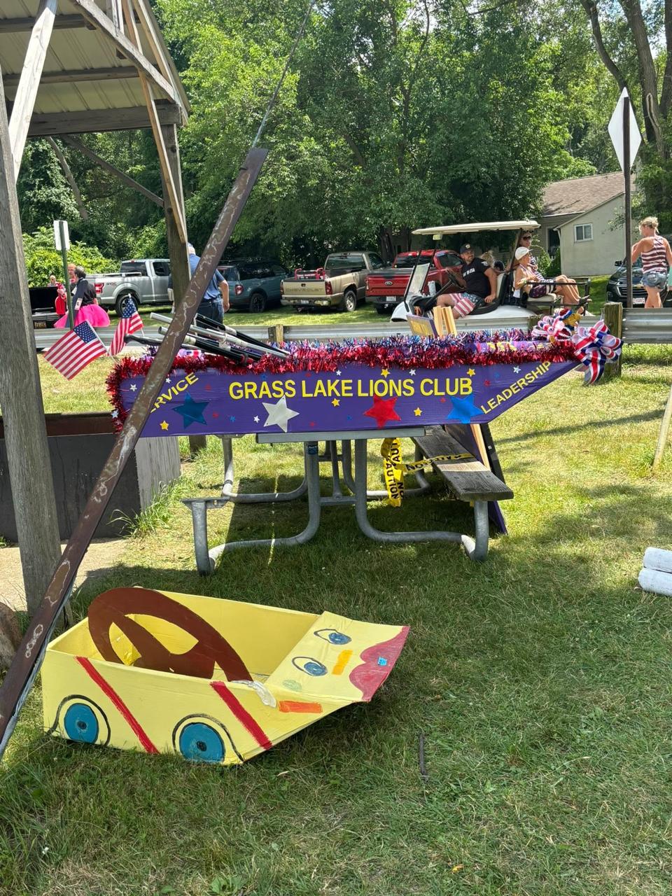 Grass Lake Lions Club cardboard boat display at the county park