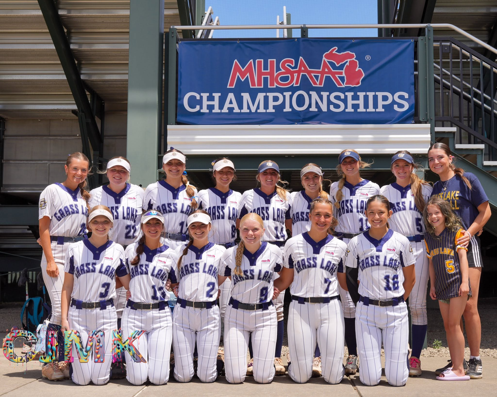 Warriors softball celebrating on the field
