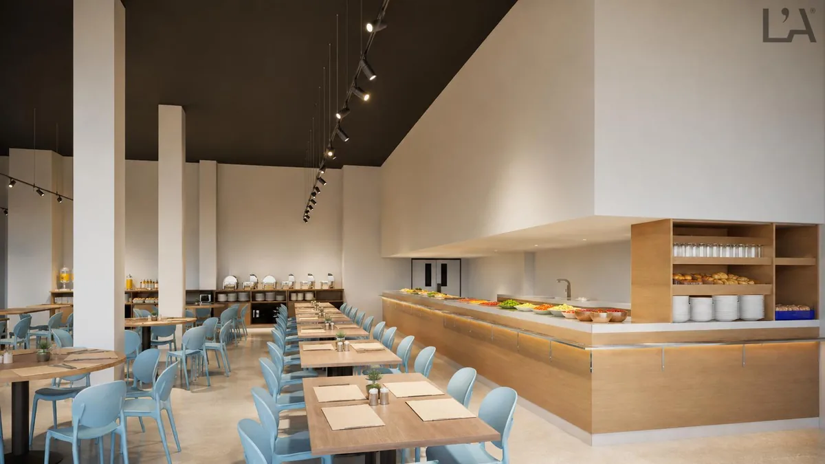 The dining hall of The T3 Residence — buffet line with athlete-grade food
