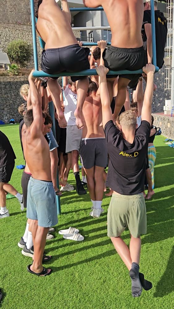 The whole squad at the pull-up bar