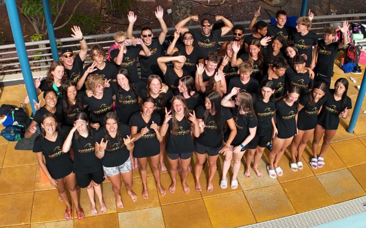 SwimPros camp group — kids and coaches together