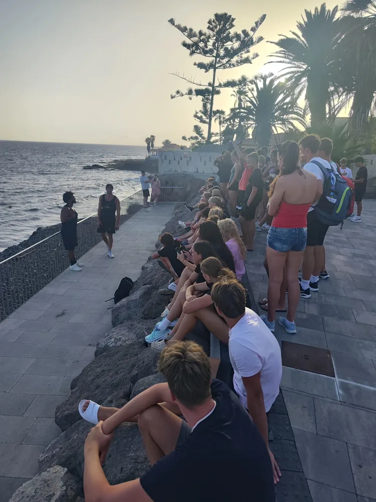 The squad watching the sunset on the seafront