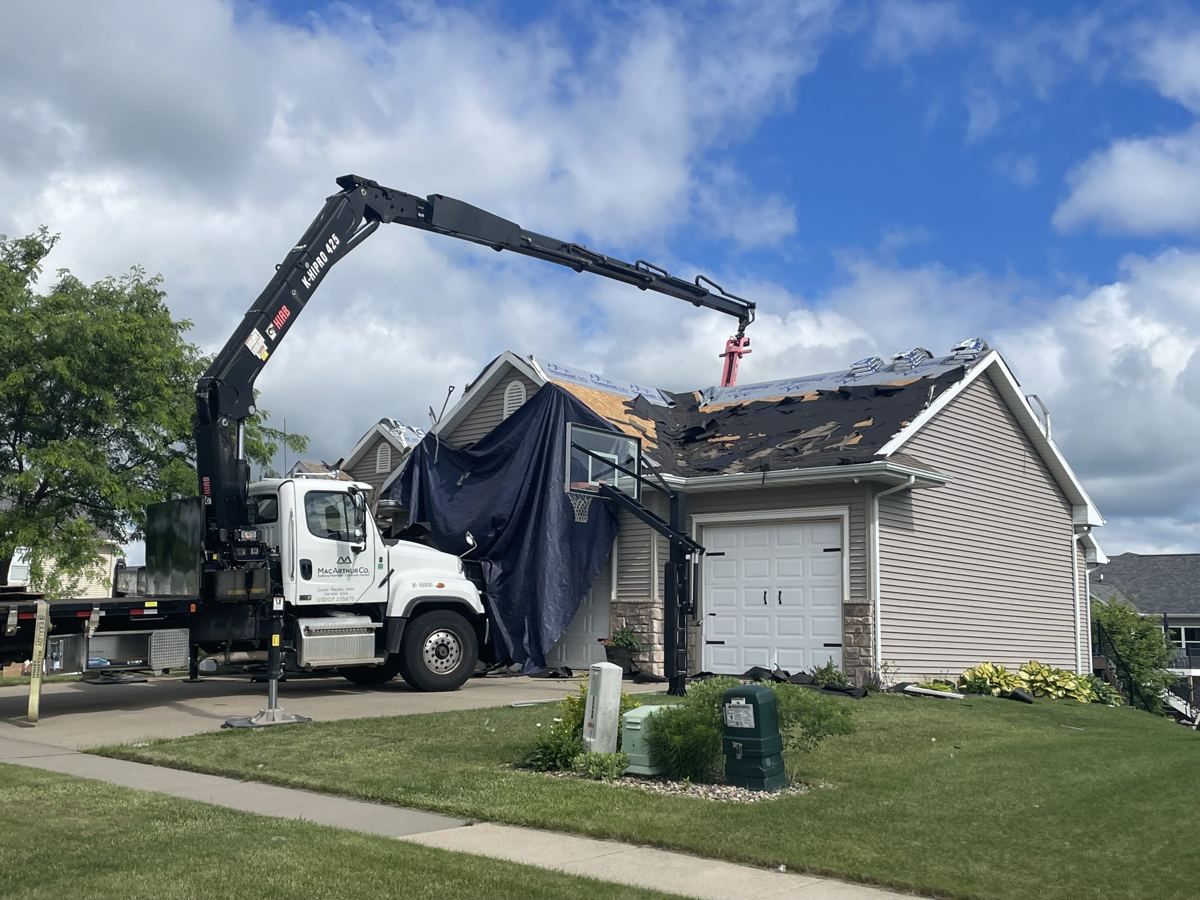 During: roof replacement in progress, Marion IA — Hawkland Exteriors