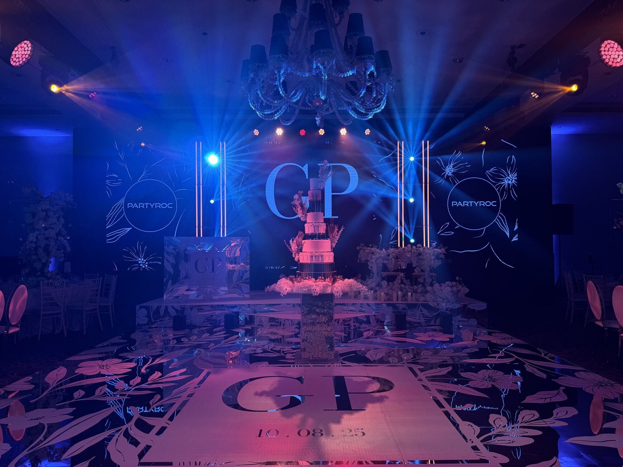 Custom printed dance floor with PartyRoc branded LED walls and full lighting production