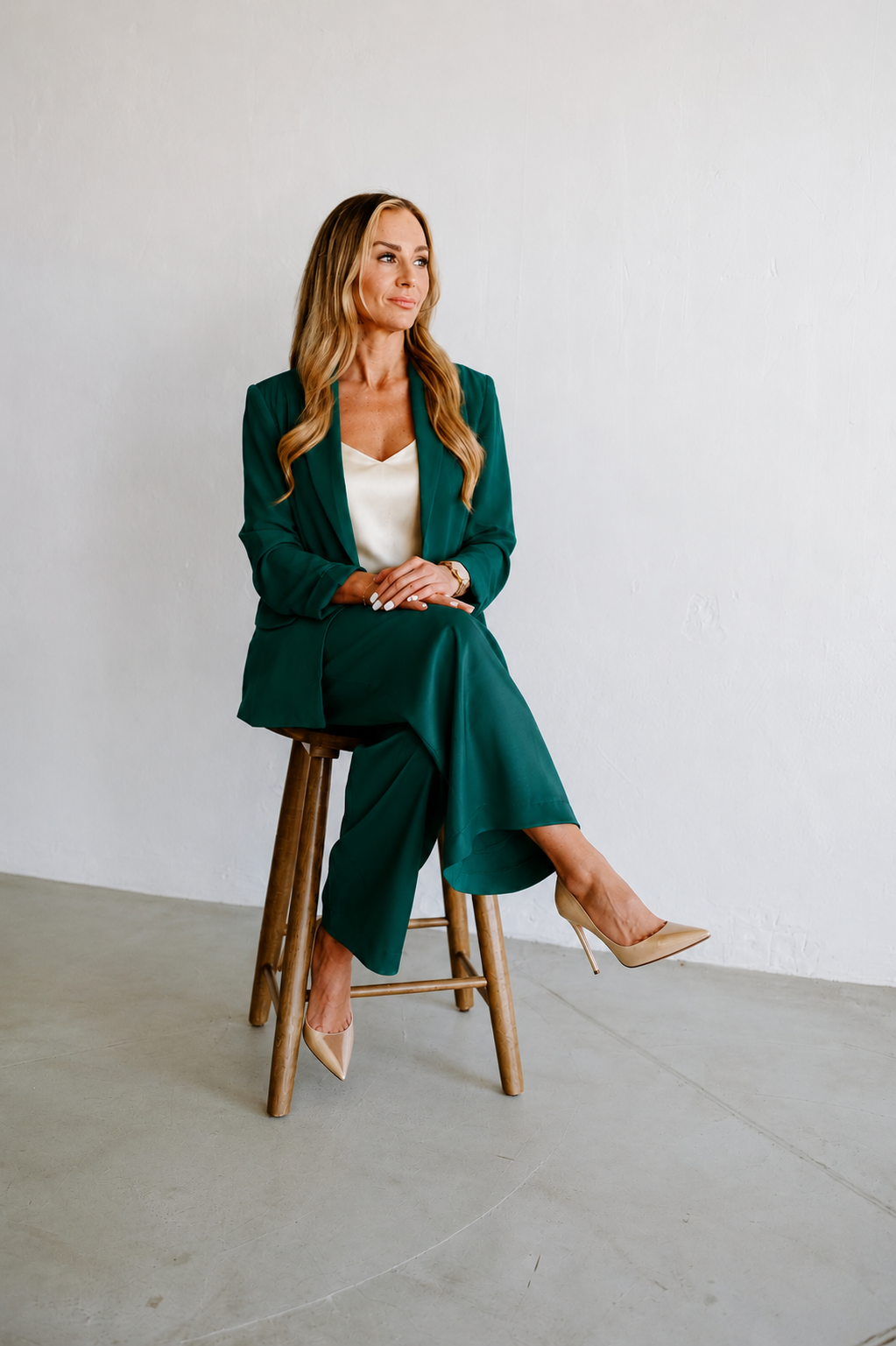 Sommer Leigh in emerald suit