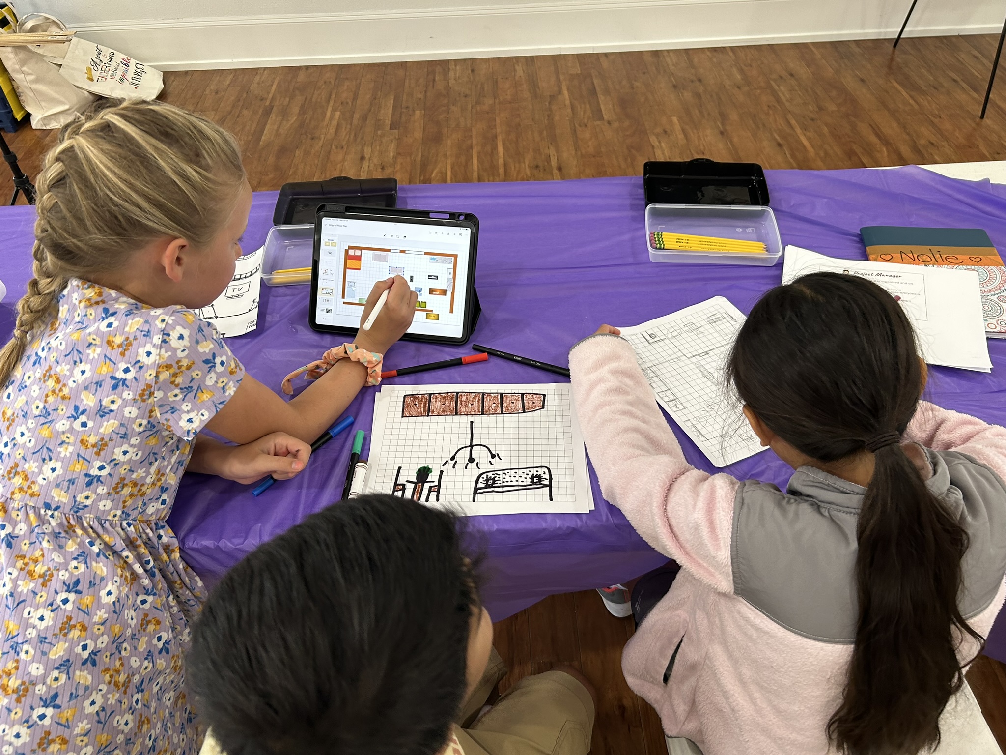 Students presenting their tiny home design, June 2025