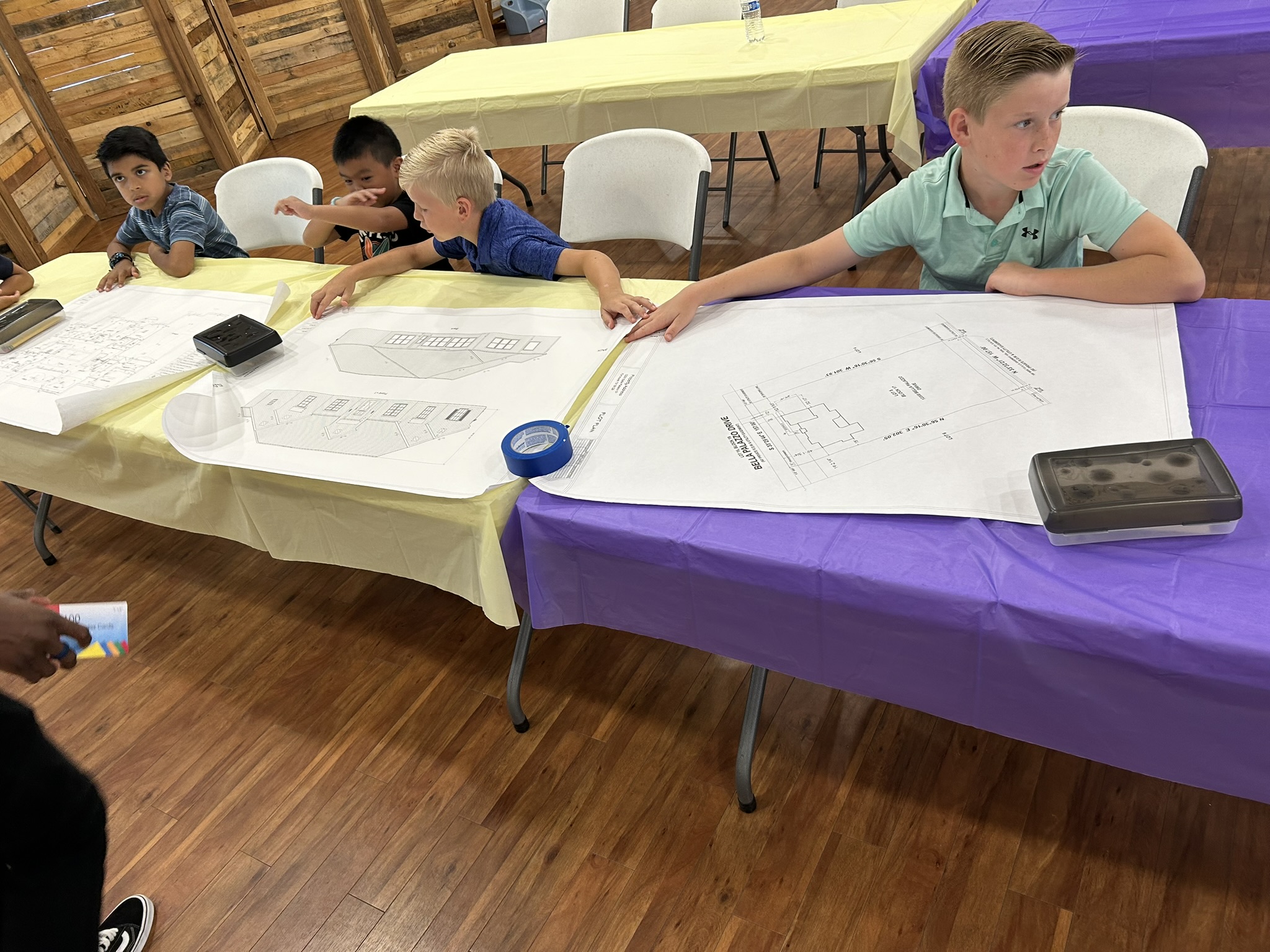 Camp students collaborating on a build, June 2025