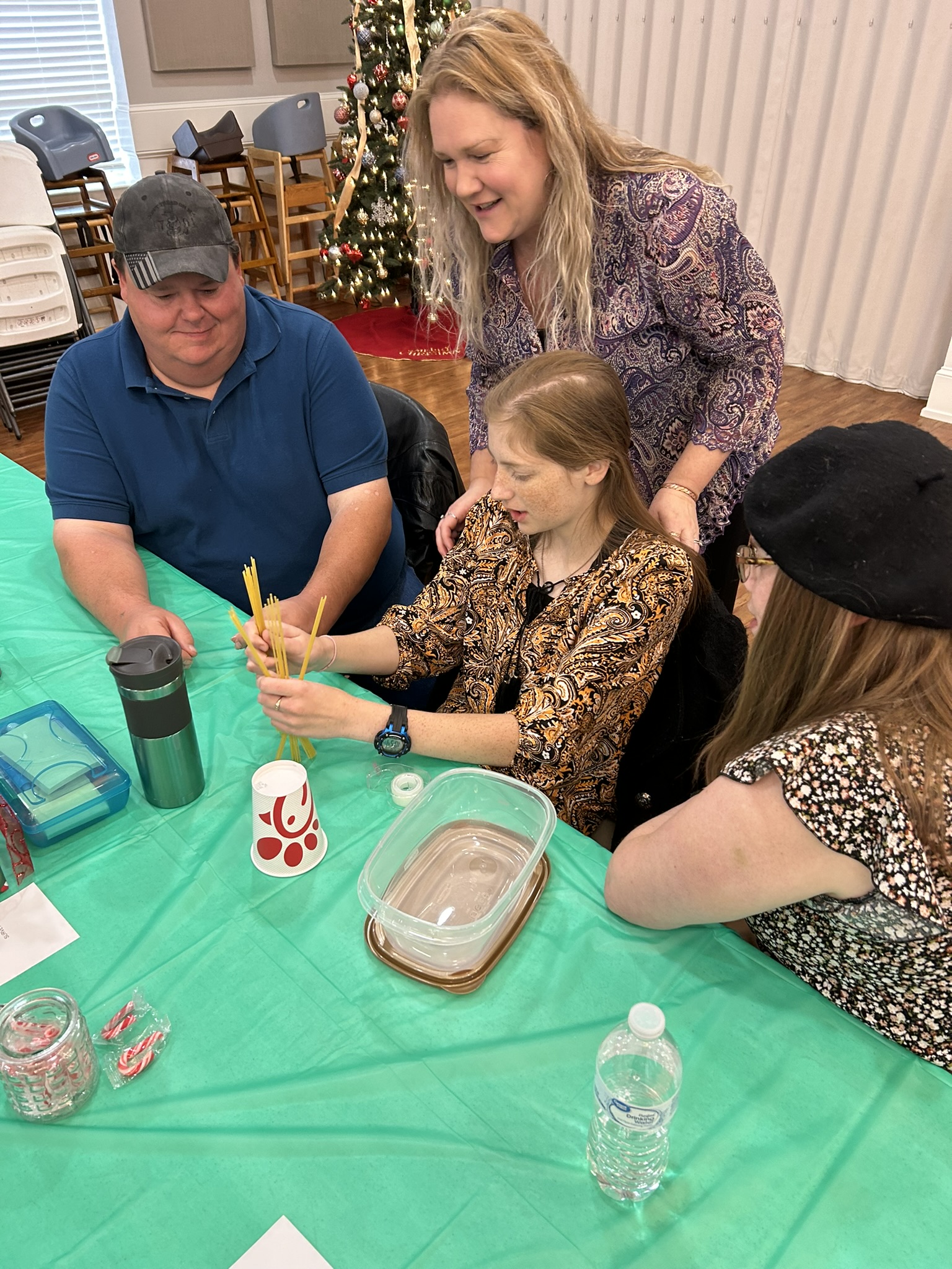 Community members in conversation, December 2024