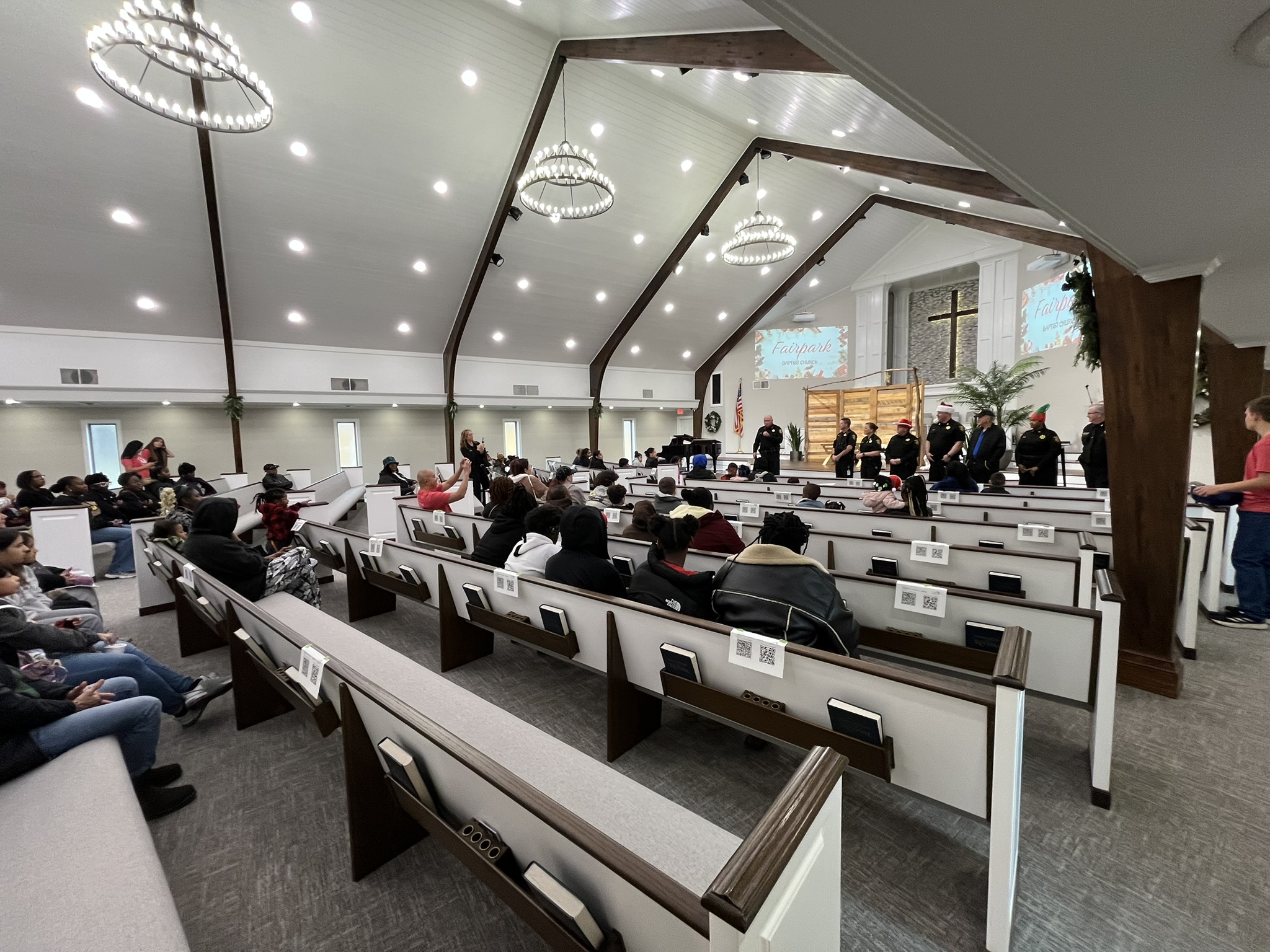 Families and children at the Christmas celebration, December 6, 2025