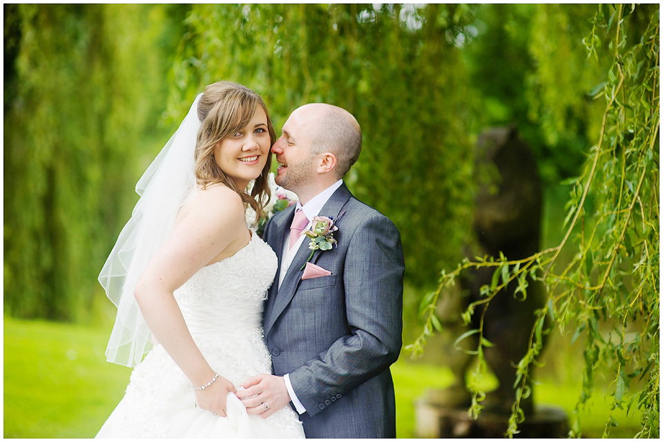 Rainy Barn Wedding with White Umbrellas