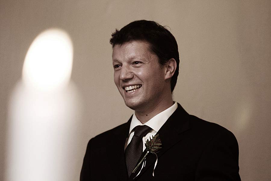 Groom waiting for his bride to arrive at the alter
