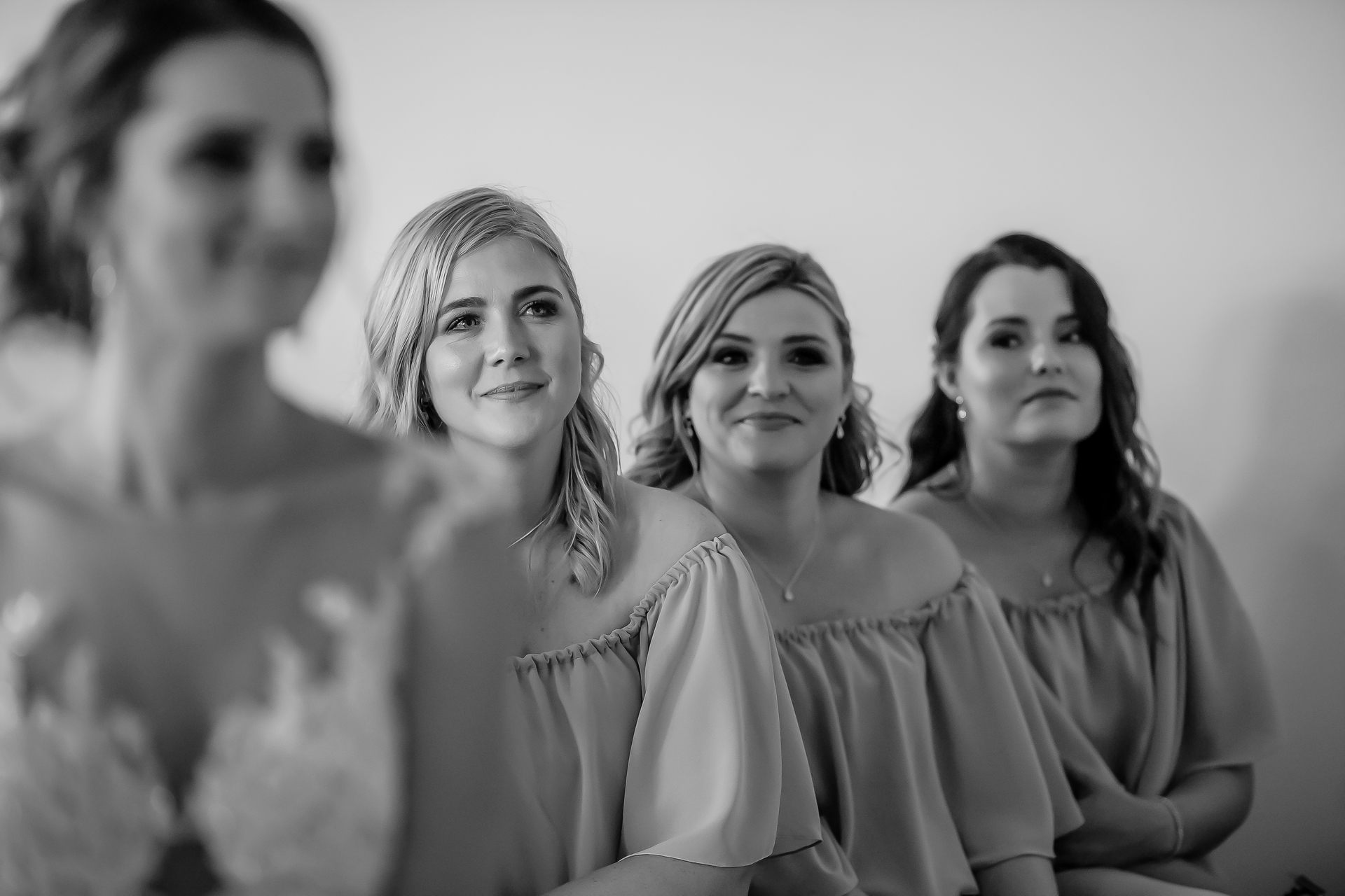 Bridesmaids watching the bride