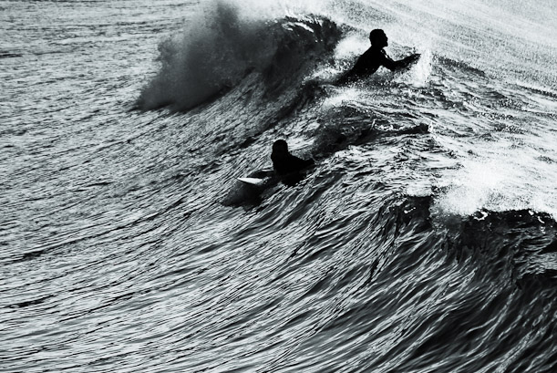 Sunset over Los Locos. Surfing waves in Spain