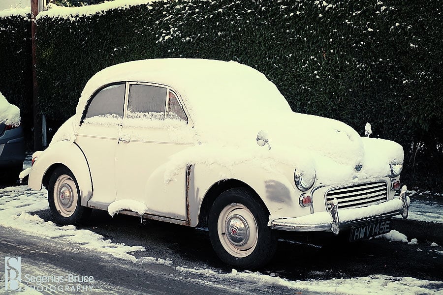 Snow over a Morris Minor car in Surrey 2009