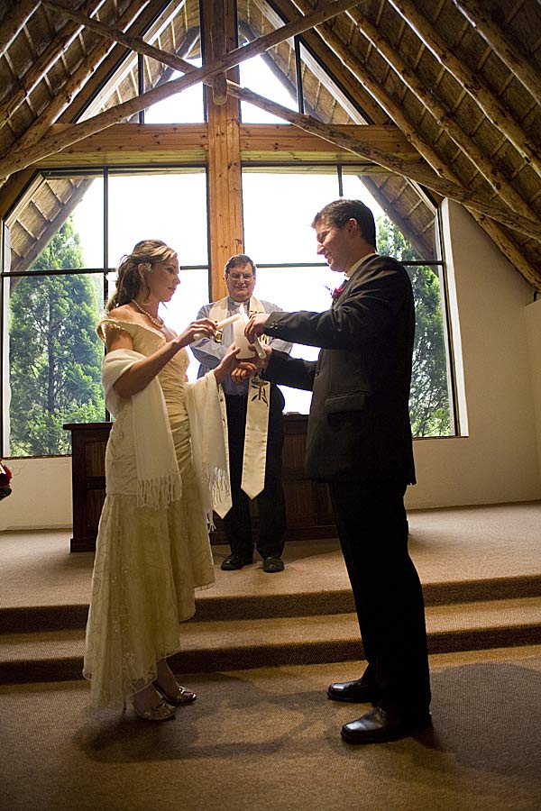 Candle lighting ceremony at a wedding in the chapel at Cathedral Peak