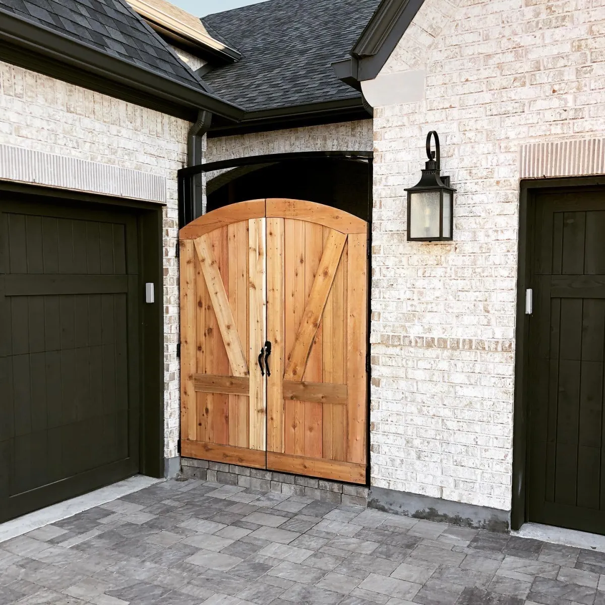 Custom cedar wood fence gate installed at a Carrollton TX home, designed for privacy and curb appeal.