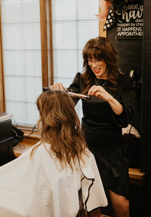 Jen curling hair
