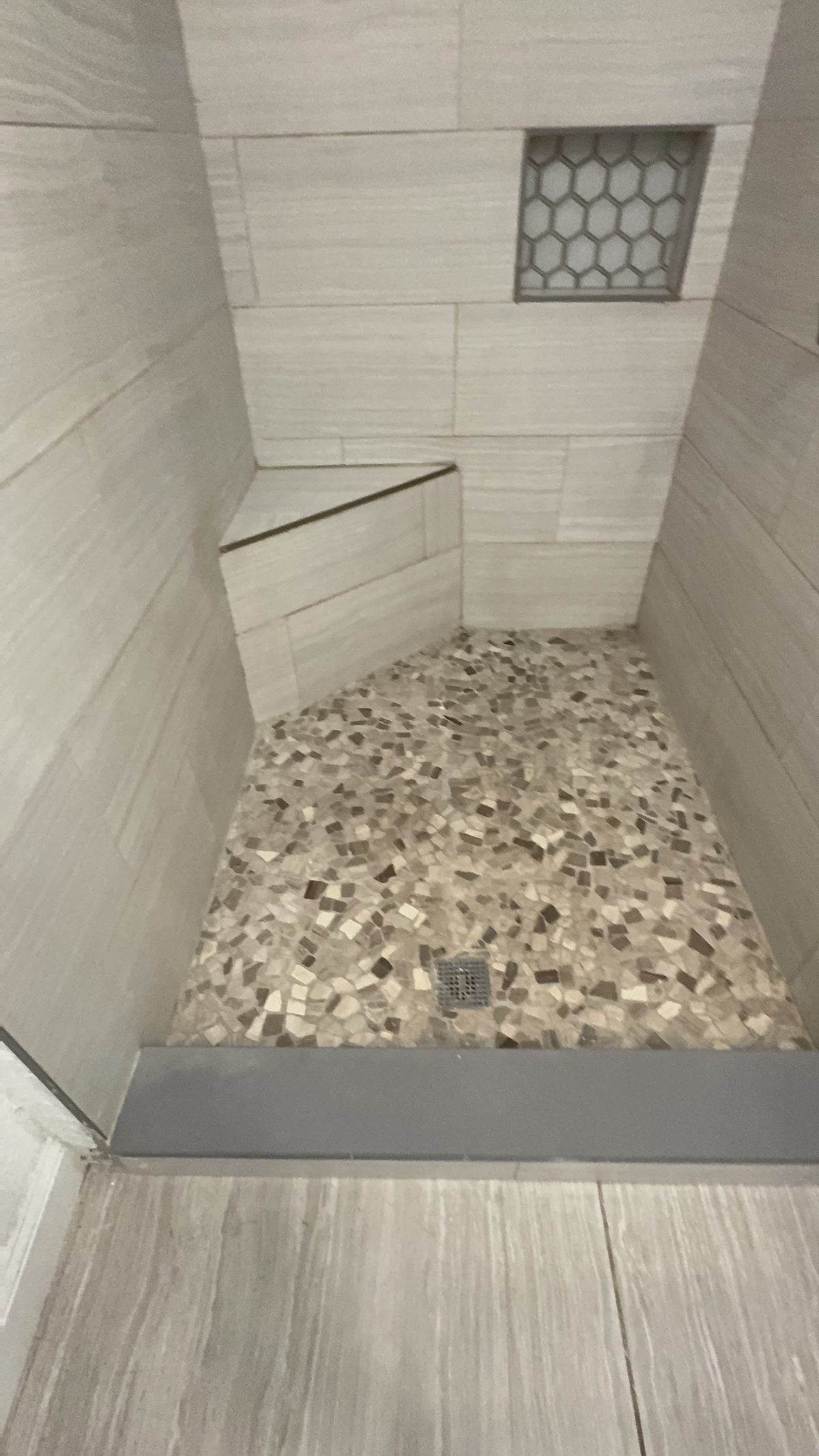 A tiled shower after a Floor 2 Ceiling deep clean