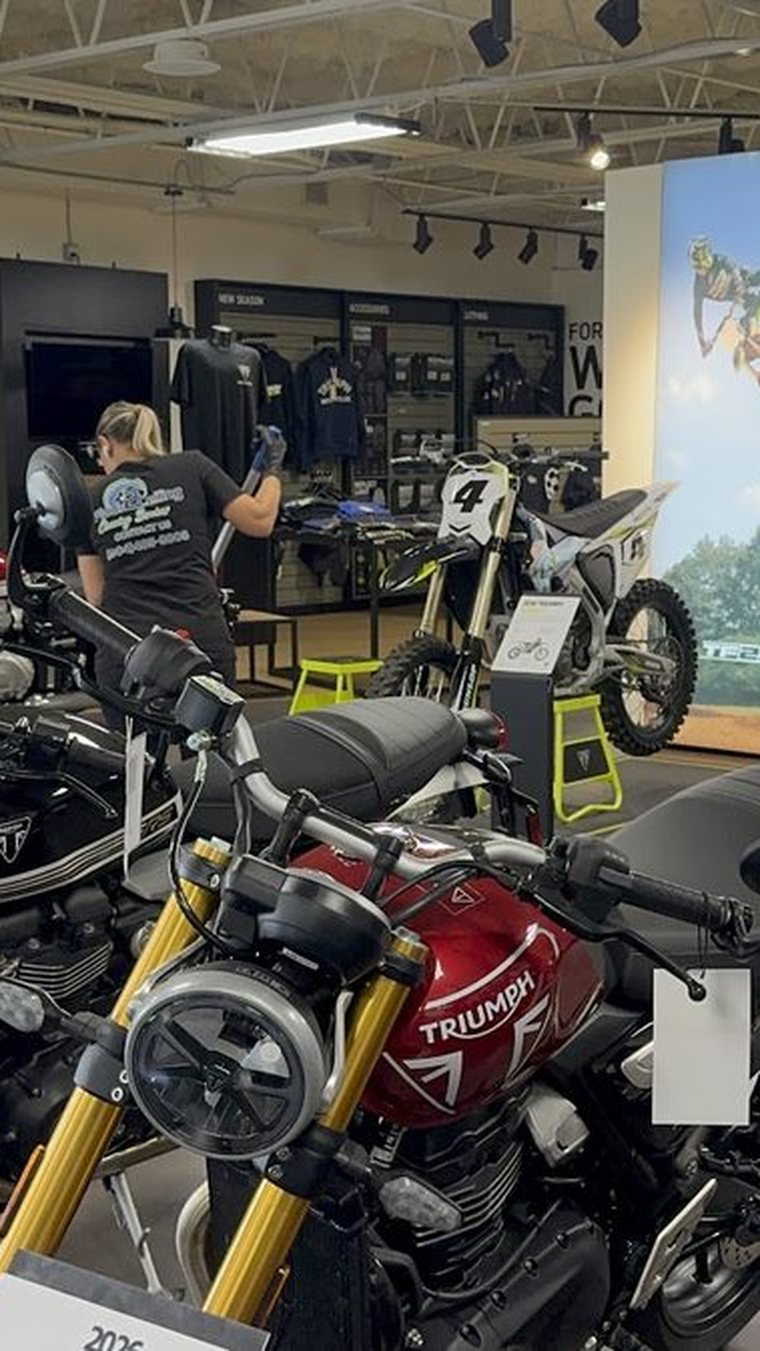 A motorcycle dealership showroom cleaned by Floor 2 Ceiling