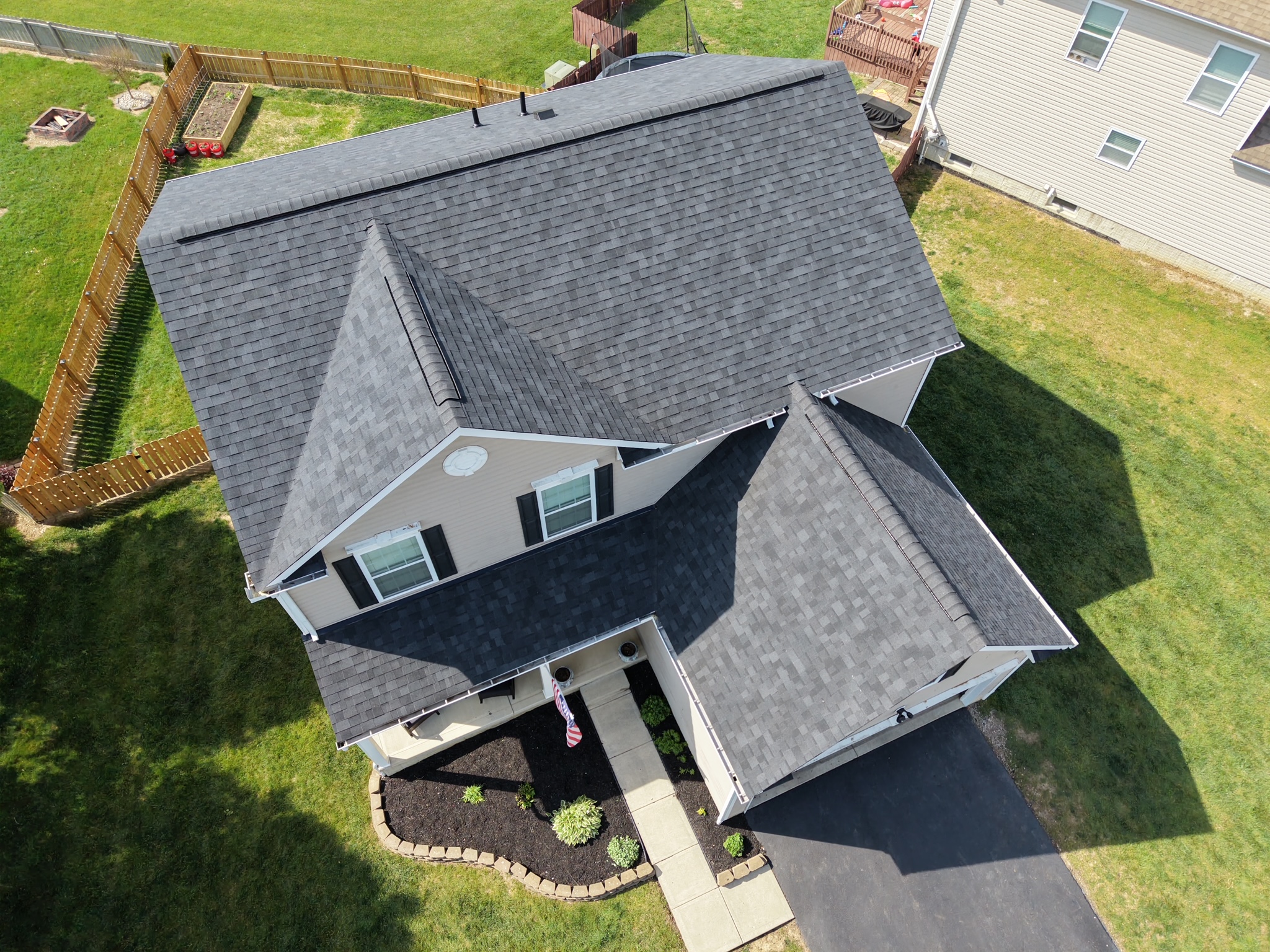 Roofing crew at work on a Grove City property