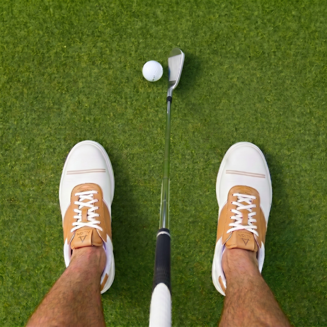 Align golf shoe — downward POV at address